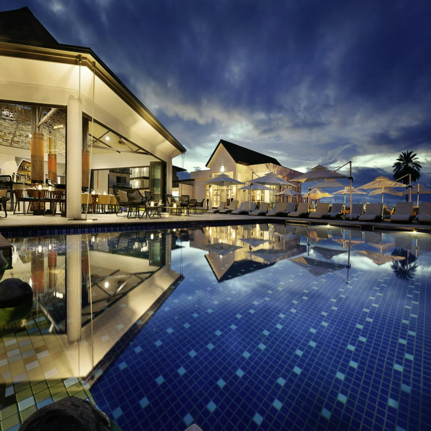 Club pool and lounge at night